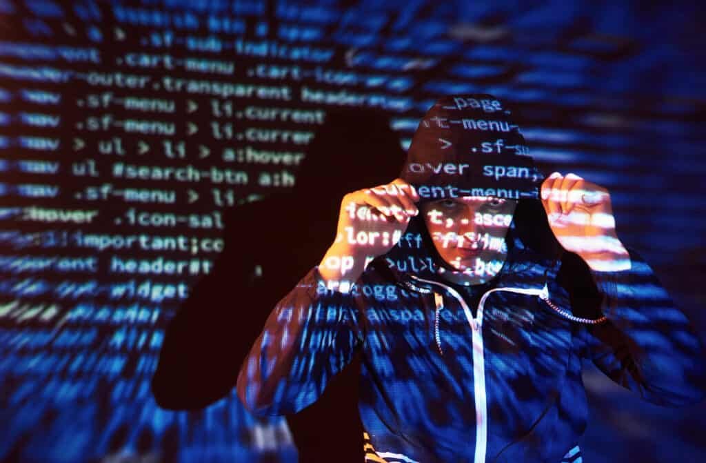 cyber attack with unrecognizable hooded hacker usi 2021 08 29 13 15 30 utc
