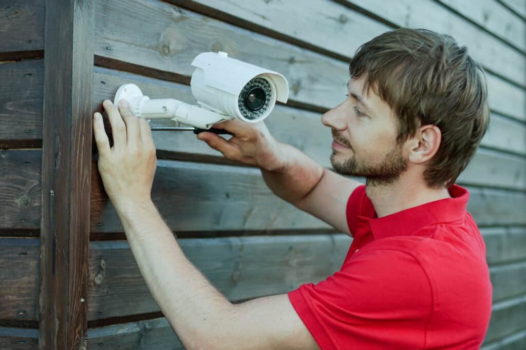 caucasian technician installing ip wireless cctv c 2022 10 13 18 49 45 utc