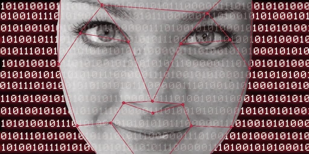 A woman's face deptected as an algorithm with binary in the backgroun. The picture depicts the technology behind a Quantum AI Scam