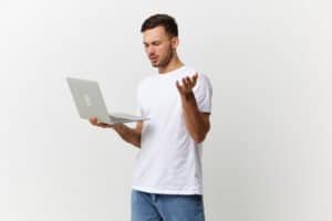Click on the image of a man with a laptop to connect to the blog - Ticketmaster Scams