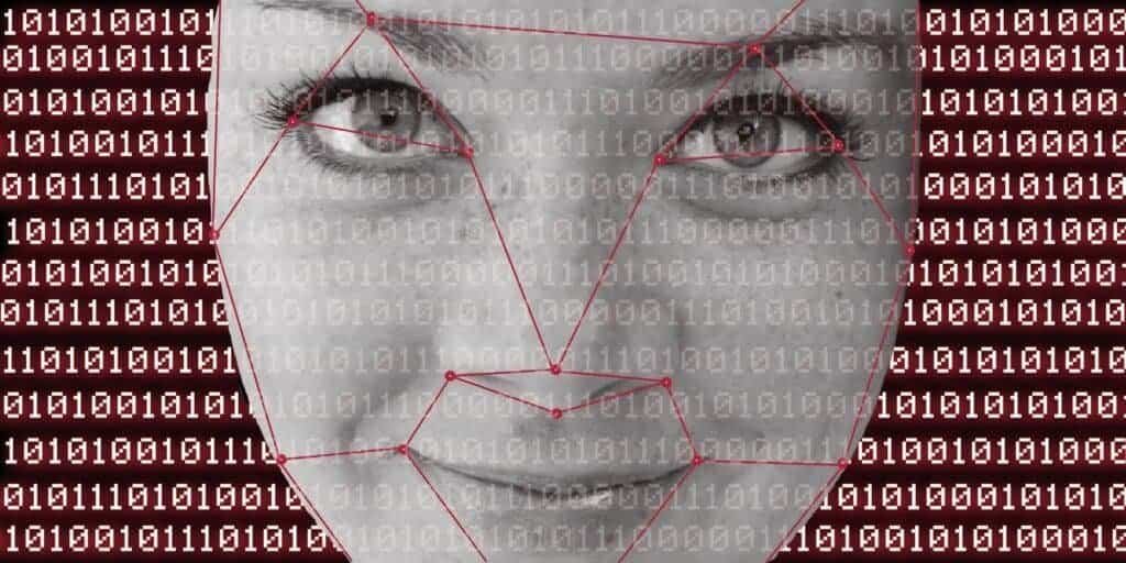 A woman's face deptected as an algorithm with binary in the backgroun. The picture depicts the technology behind a Quantum AI Scam